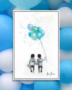 Two twins holdings hands holding blue balloons and a teddy bear on a white background.