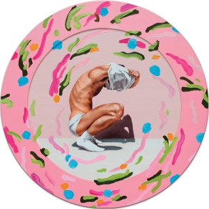 Man crouched down taking shirt off wearing white underwear and white shoes