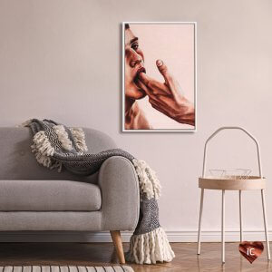 Close up of man with another man's fingers inside of his mouth