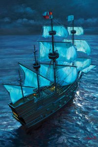 A ship with sails moving through the sea