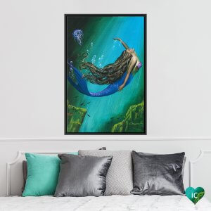 Mermaid with purple tail swimming underwater near a jellyfish