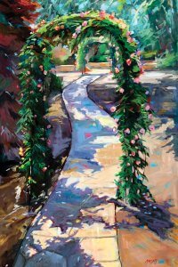 Pathway with rose arches surrounded by trees