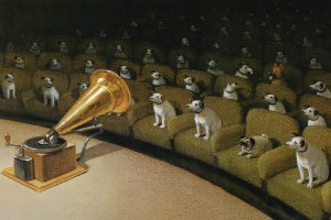 A group of dogs sitting in theatre seats facing a gramophone