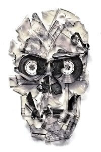 Skull made of cassette tapes against a white background