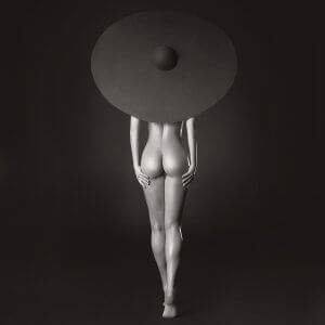 The backside of a nude woman wearing an oversized black hat