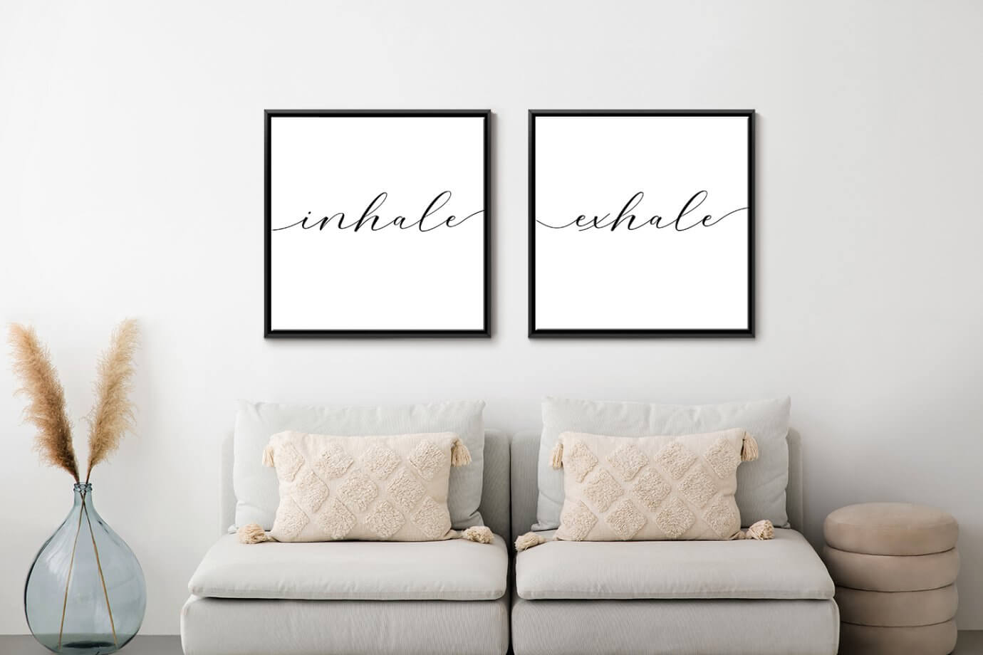 inhale and exhale art prints above couch
