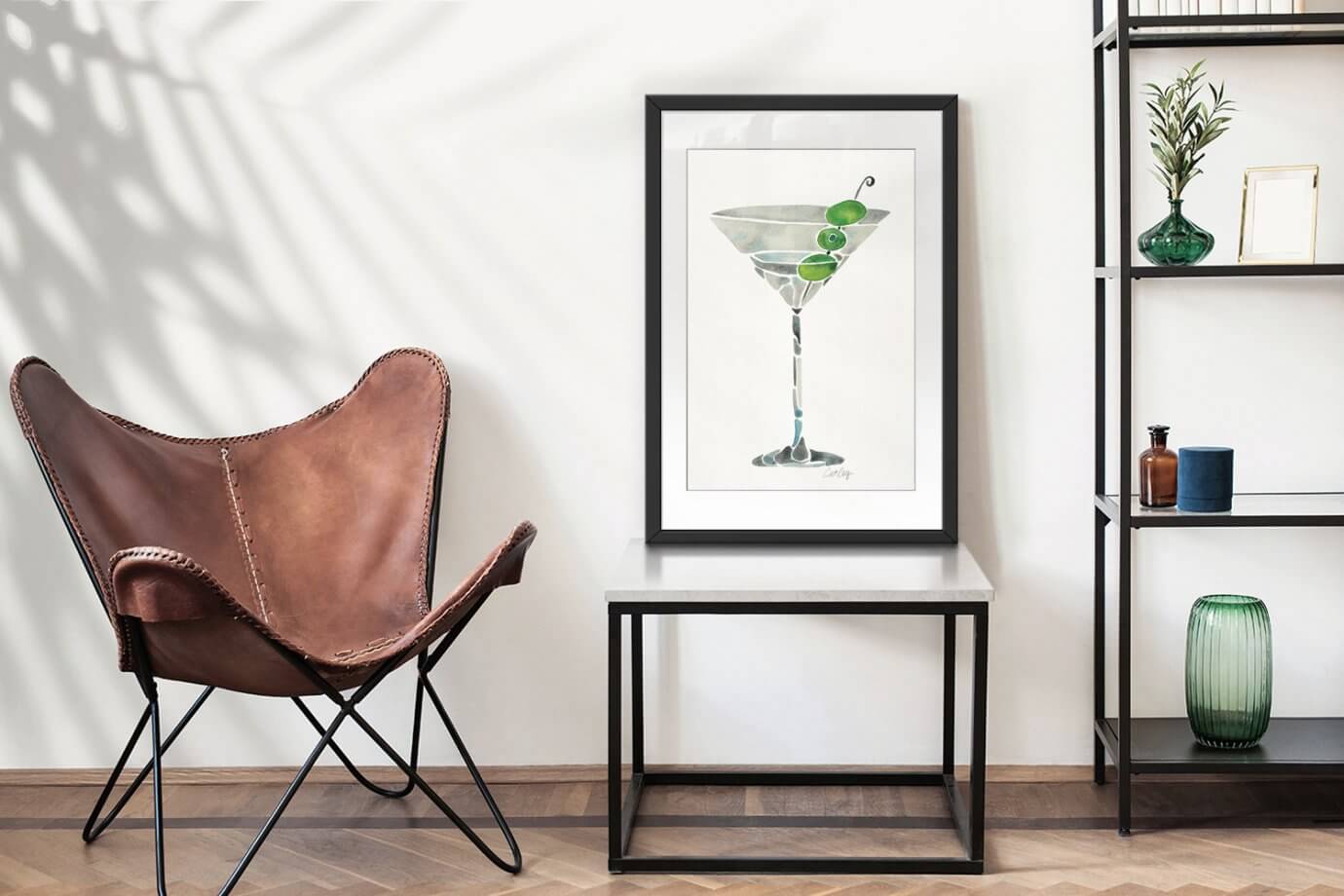 martini artwork sitting on side table