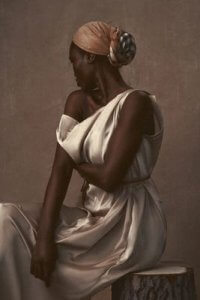 portrait of black woman looking down at her shoulder wearing a headwrap and white dress
