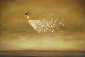 woman floating in the sky wearing a white dress with birds flying out the bottom half