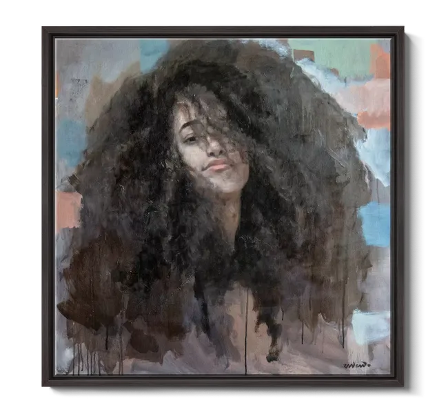 portrait of woman with big curly hair
