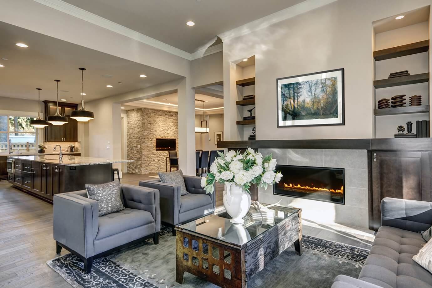 forest artwork above fireplace