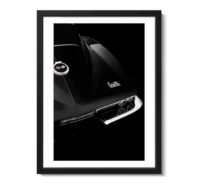 Close up of black corvette