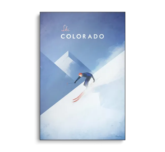 Man skiing on snowy mountains with the words “ski colorado”