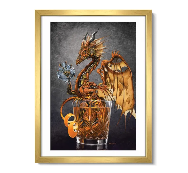Gold dragon sitting inside of a liquor glass