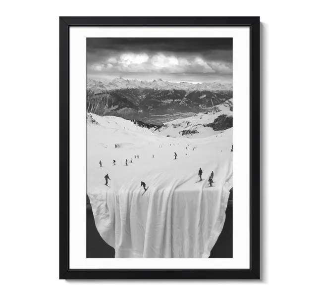 Group of people skiing on a large white sheet