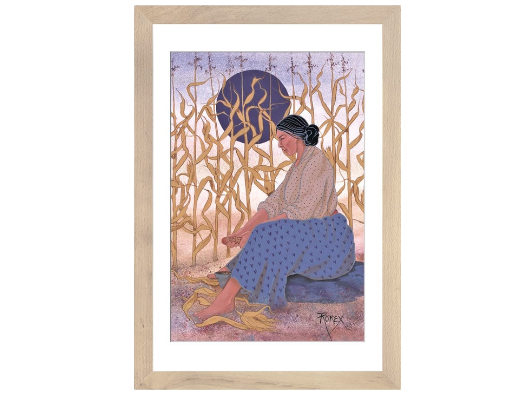 native american woman shelling corn