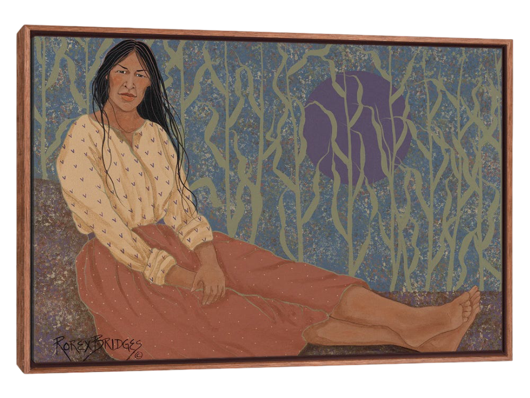 native american woman resting under a full moon