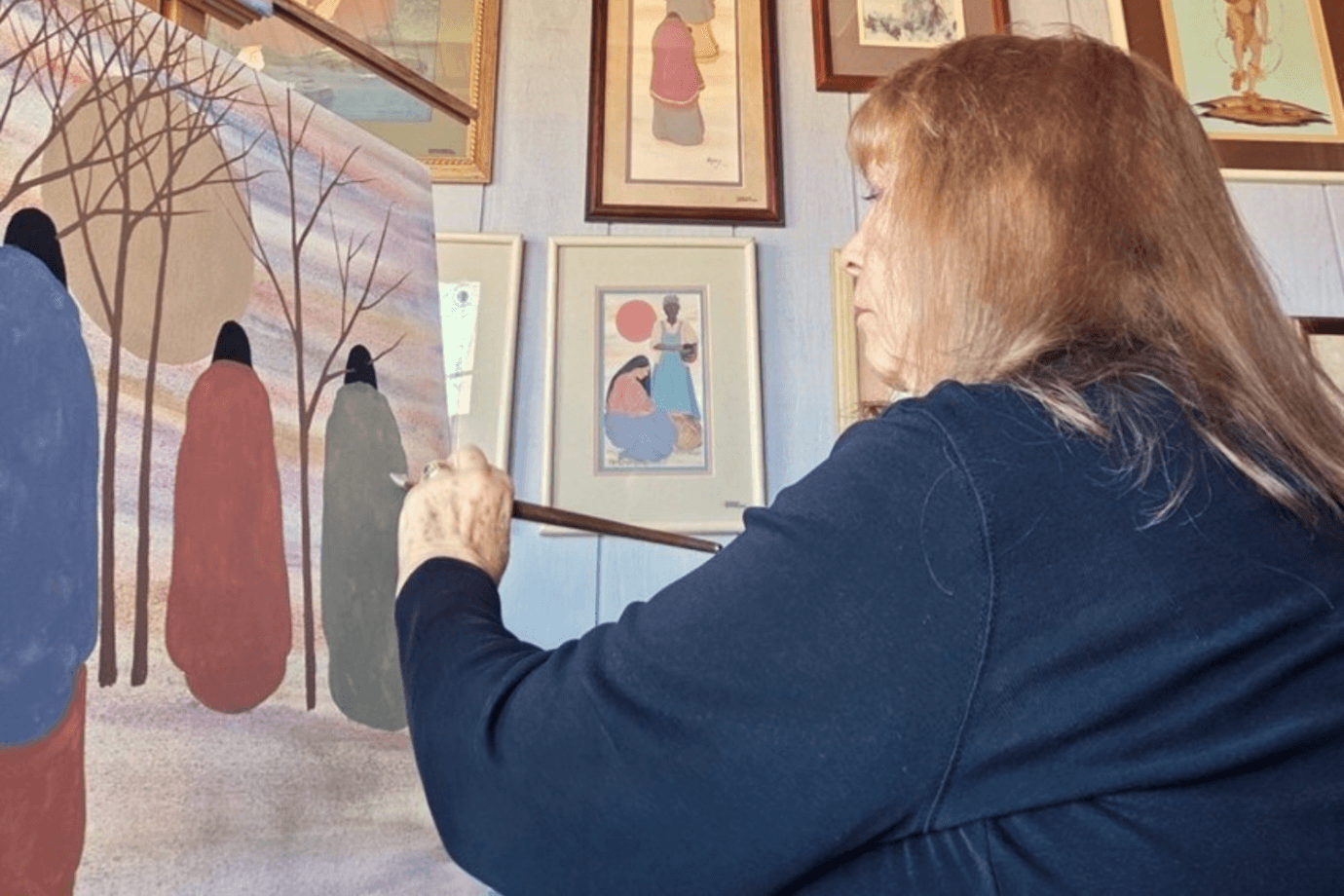 rorex bridges studio cherokee artist working on a painting