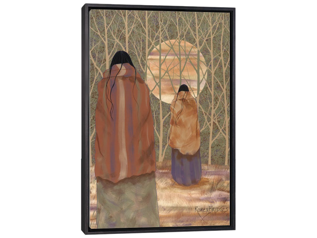 native american women in blankets facing a full moon surrounded by trees