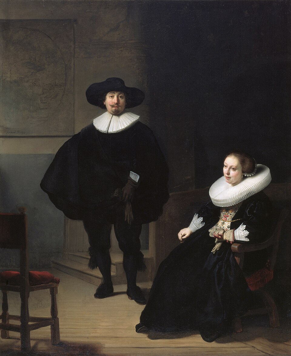 a lady and gentleman in black portrait