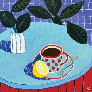 blue table with cup of coffee, a lemon, and a plant