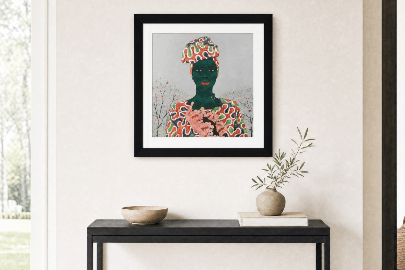 nigerian artwork hanging above an entryway table