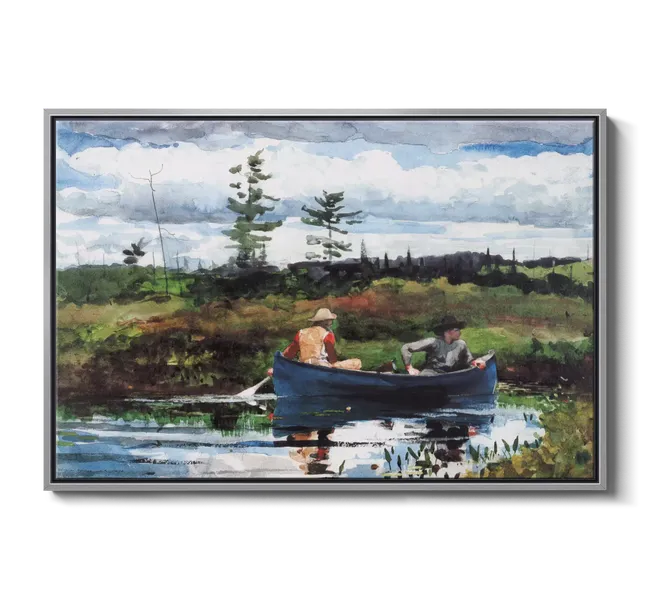 two people sitting in a boat surrounded by greenery