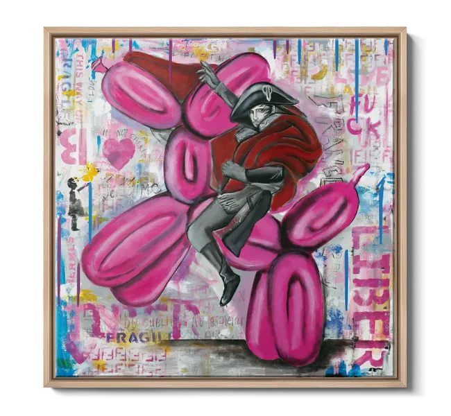 man riding pink balloon animal dog with graffiti background