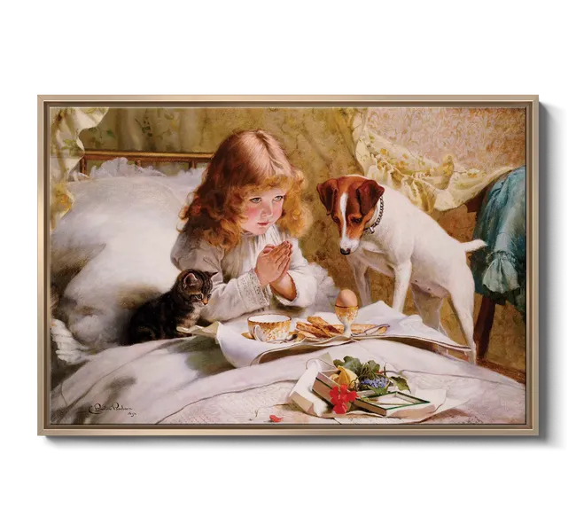 young girl praying in bed with a dog and cat and tray of food on her lap