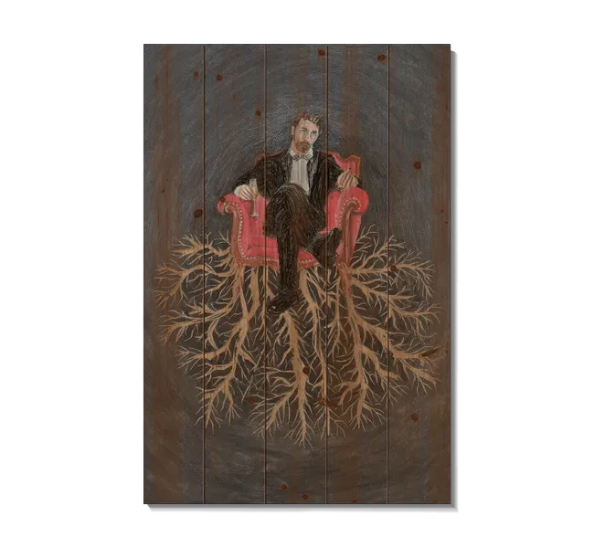 Man sitting in chair with branches extended out below
