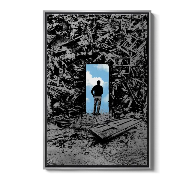 man standing in doorway surrounded by black graffiti