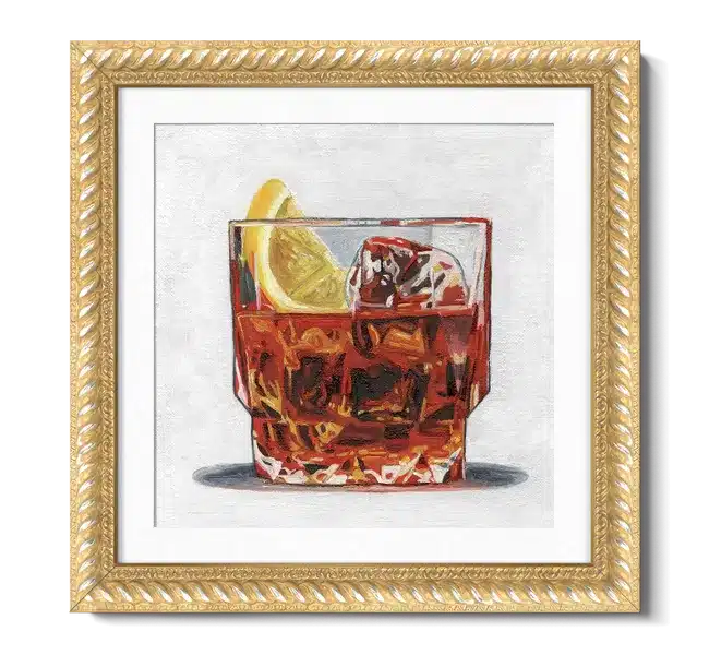 liquor in glass with ice and lemon