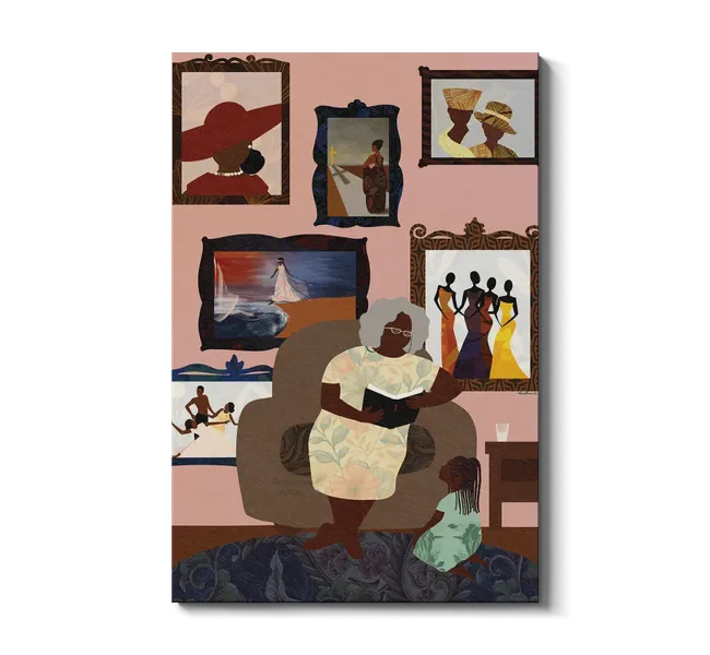 black grandmother sitting in chat with gallery wall of family photos behind her
