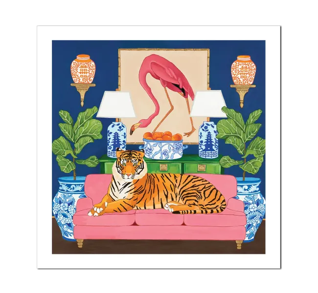 tiger on pink couch surrounded by chinoiserie jars and flamingo wall art
