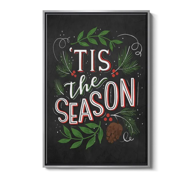 the words "tis the season" surrounded by christmas greenery