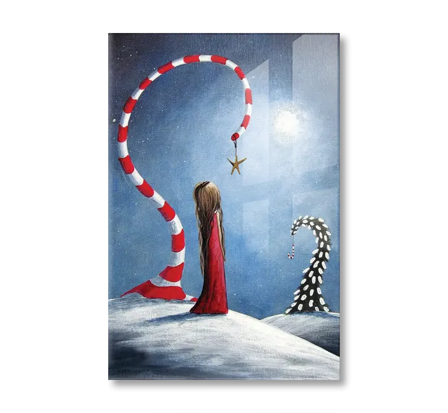 girl in red dress standing underneath a red and white striped tree