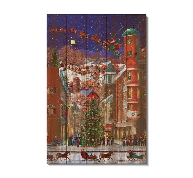 town with christmas tree and carolers