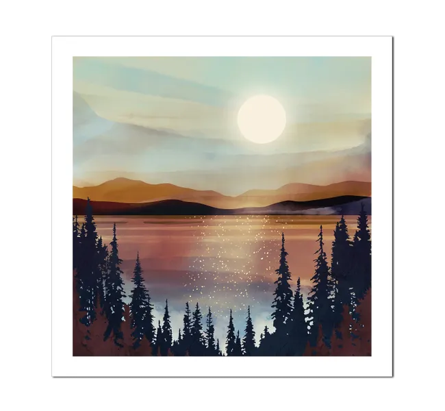 sun setting over a lake with mountains and trees
