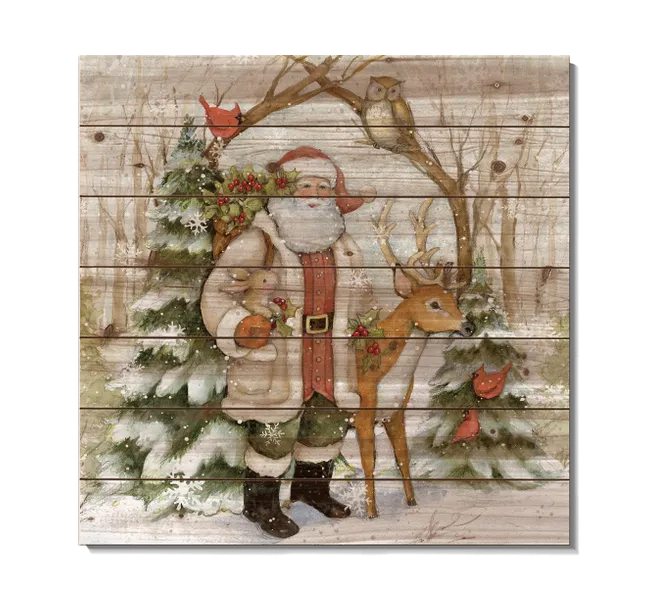 santa claus with reindeer by christmas tree